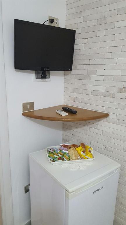 TV a/nebo společenská místnost v ubytování Baccaversa camere