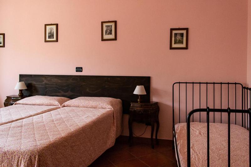 Postel nebo postele na pokoji v ubytování La Vecchia Cantina