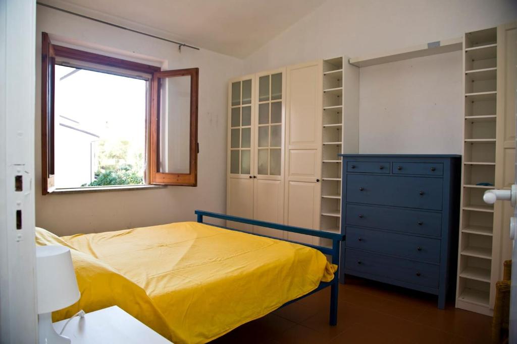เตียงในห้องที่ villa francesca e cristina