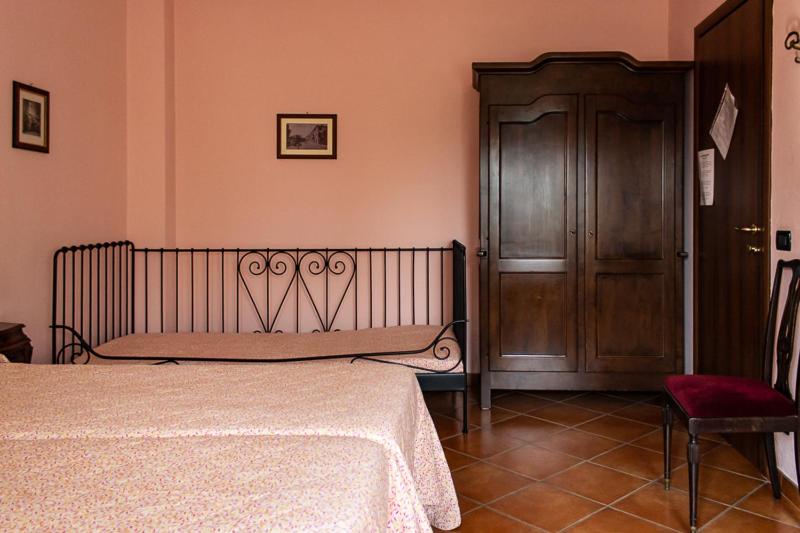 Postel nebo postele na pokoji v ubytování La Vecchia Cantina