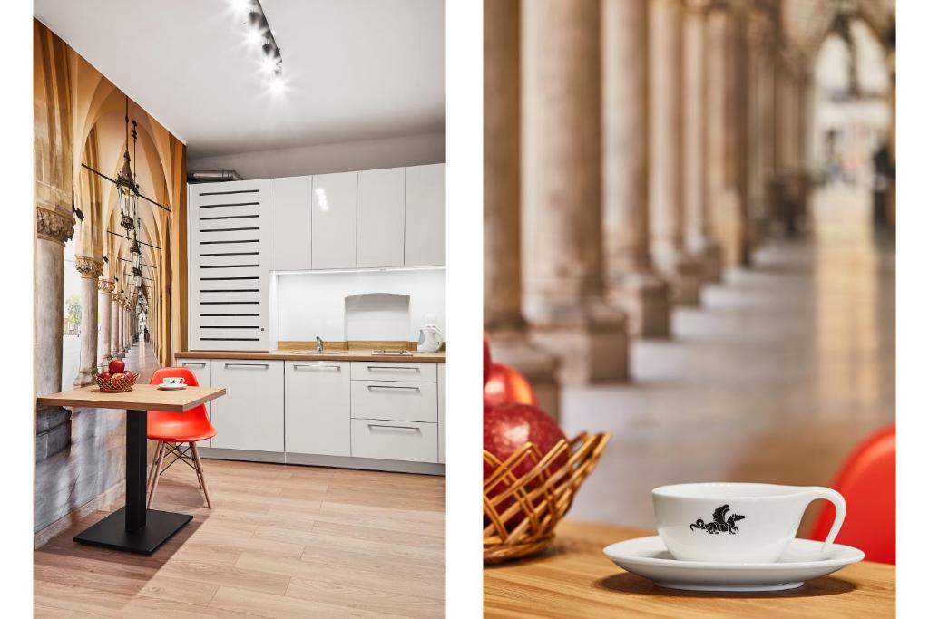 Kuchyňa alebo kuchynka v ubytovaní Krakow For You Budget Apartments