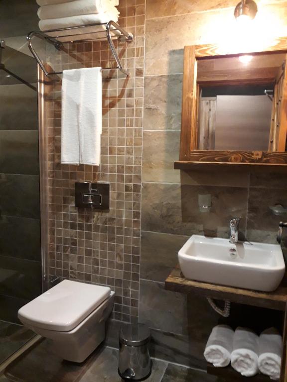 Koupelna v ubytování THE SARIGERME INN