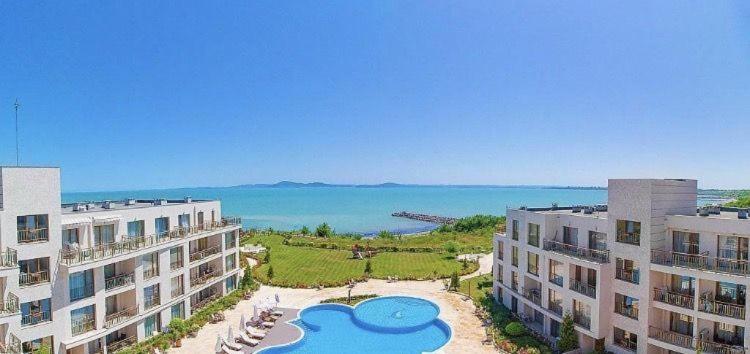 an aerial view of two buildings and a body of water at Studio in Diamond Beach in Burgas