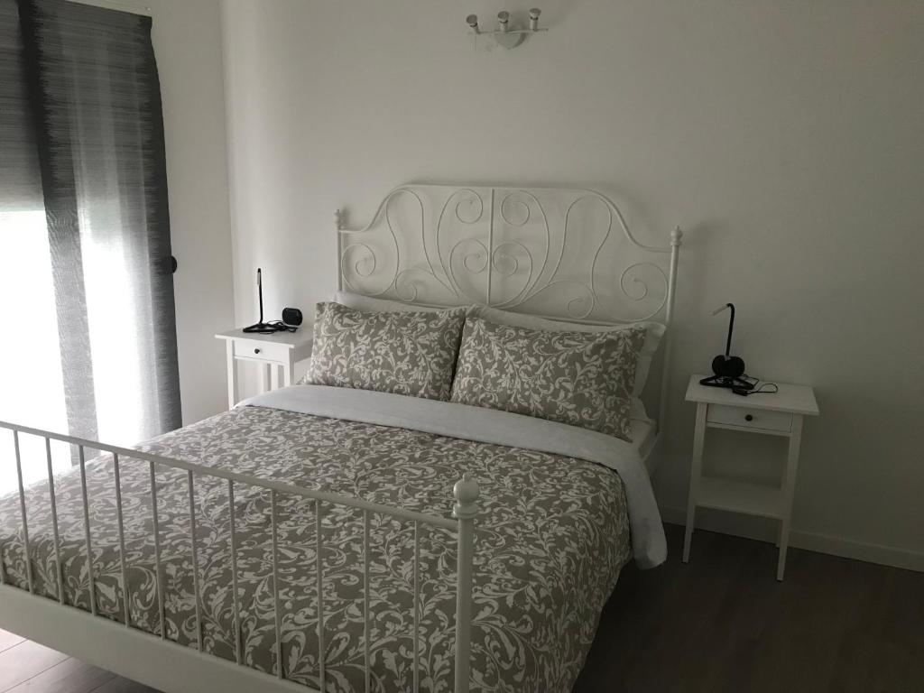 Postel nebo postele na pokoji v ubytování Hotel Residence Alessandra