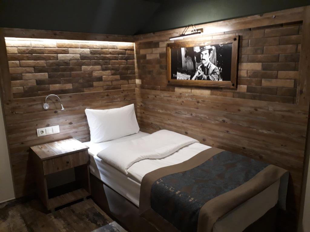 Postel nebo postele na pokoji v ubytování THE SARIGERME INN