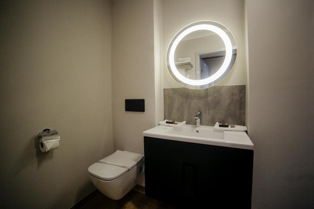 Koupelna v ubytování Royal Class Hotel