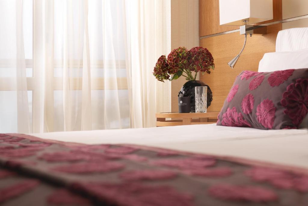 Postel nebo postele na pokoji v ubytování Divani Escape - Adults Only