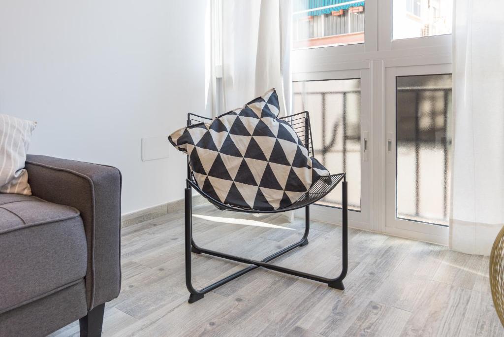 A seating area at Berlanga, apartamento en el centro