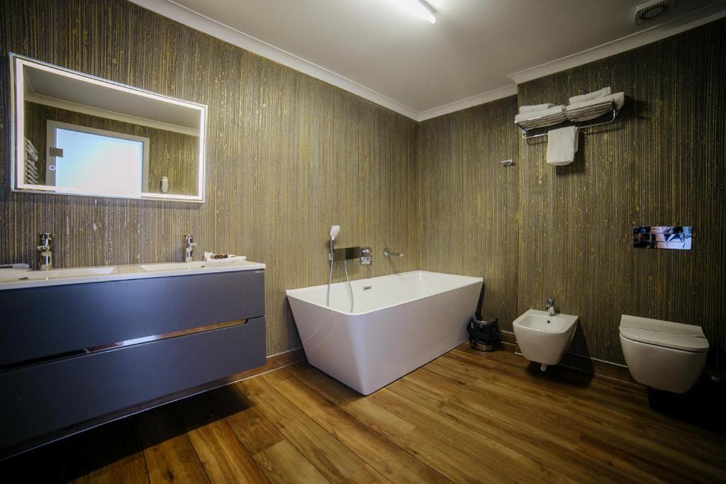 Koupelna v ubytování Royal Class Hotel