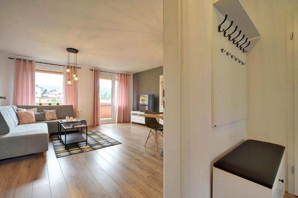 Posedenie v ubytovaní Apart-Invest Apartament Pastelowy
