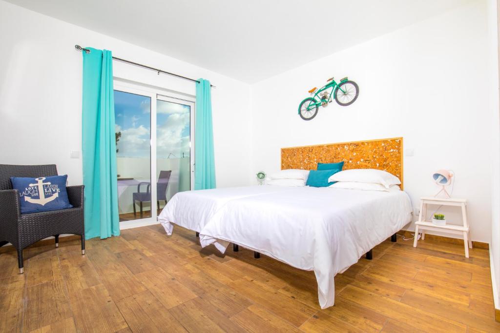 Cama ou camas em um quarto em Sagres Sun Stay - Surf Camp & Hostel