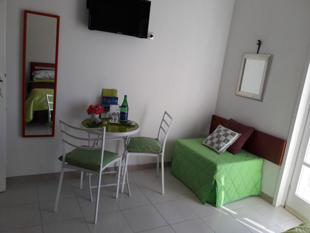 TV a/nebo společenská místnost v ubytování B&B Villa Ada