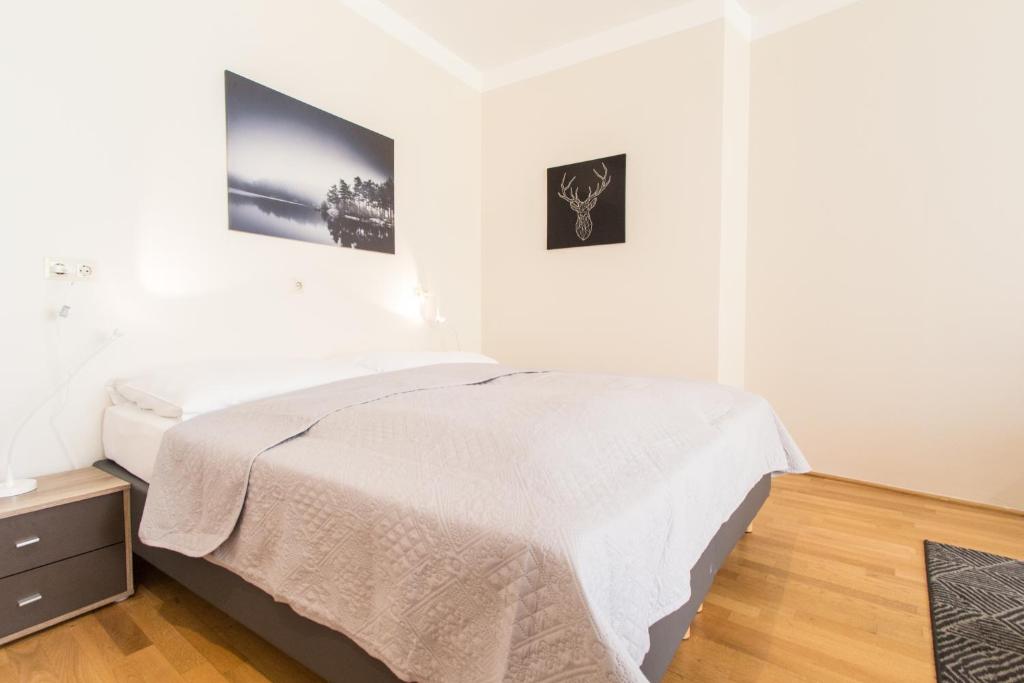 Postel nebo postele na pokoji v ubytování Apartment Kaiserstraße