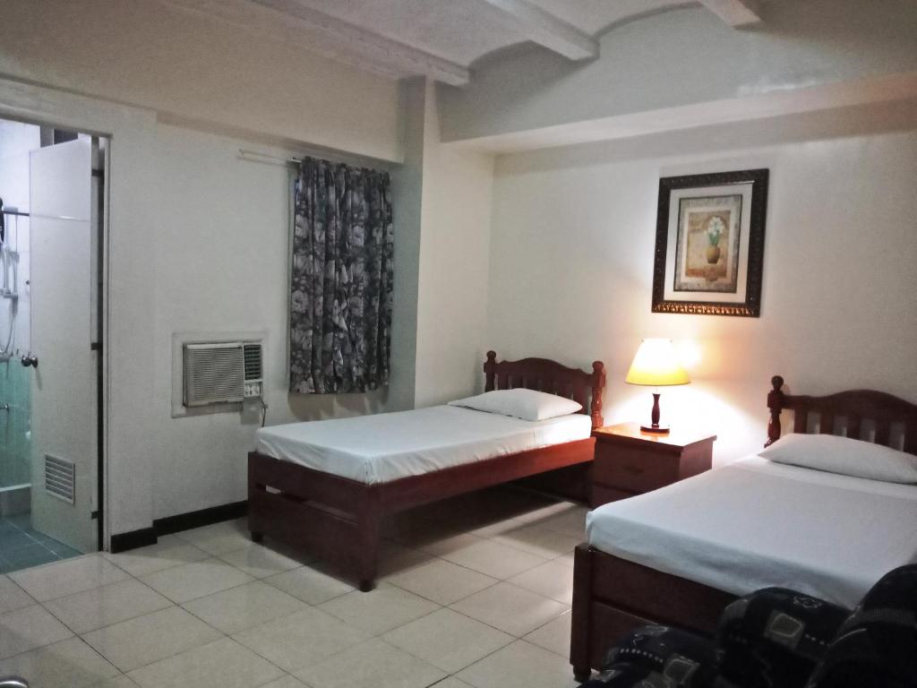 Postel nebo postele na pokoji v ubytování Casa Micarosa Hotel