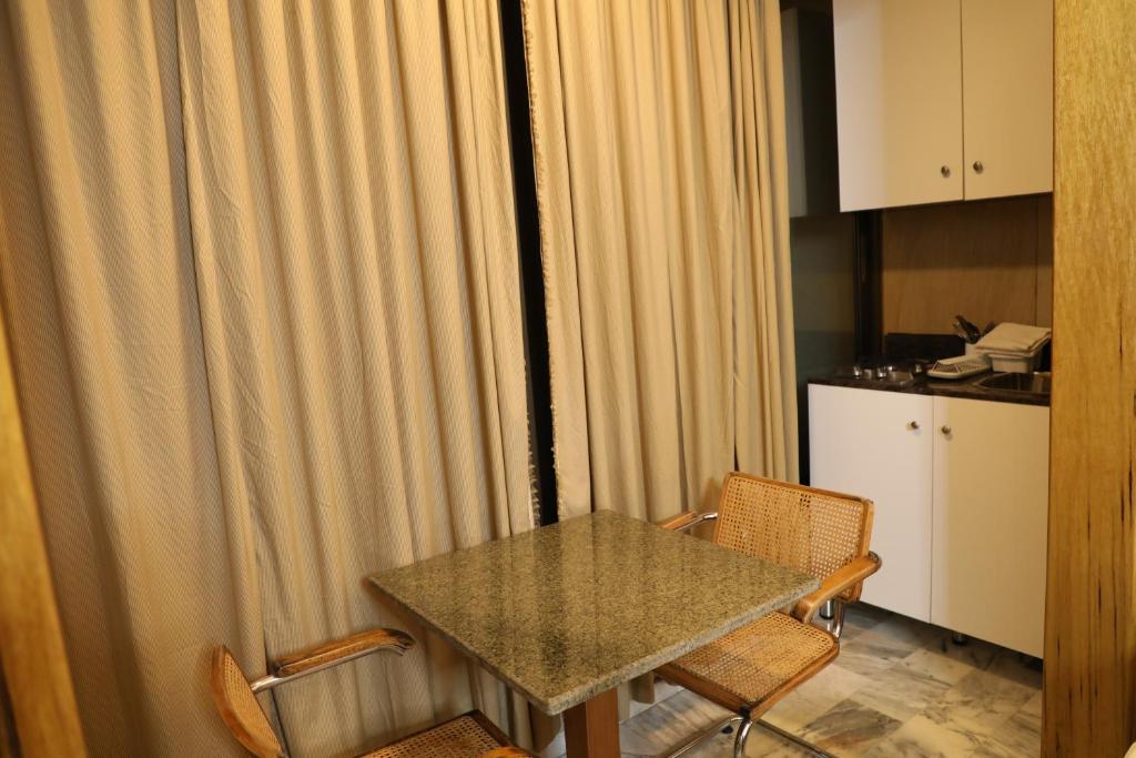 Kuchyň nebo kuchyňský kout v ubytování Viccini Suites