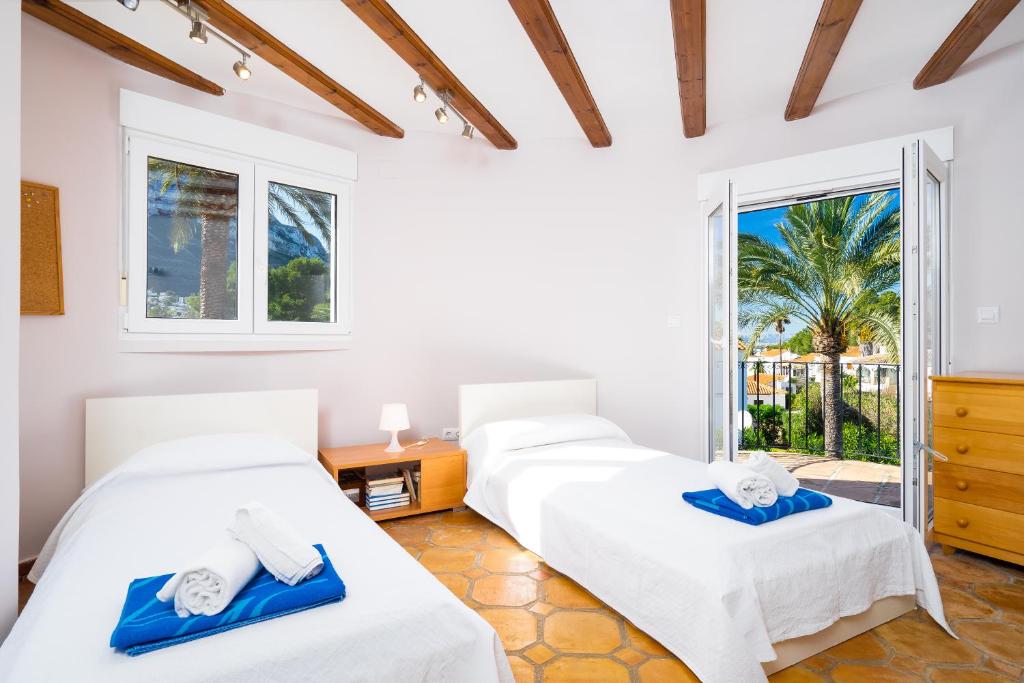 A bed or beds in a room at Anxao