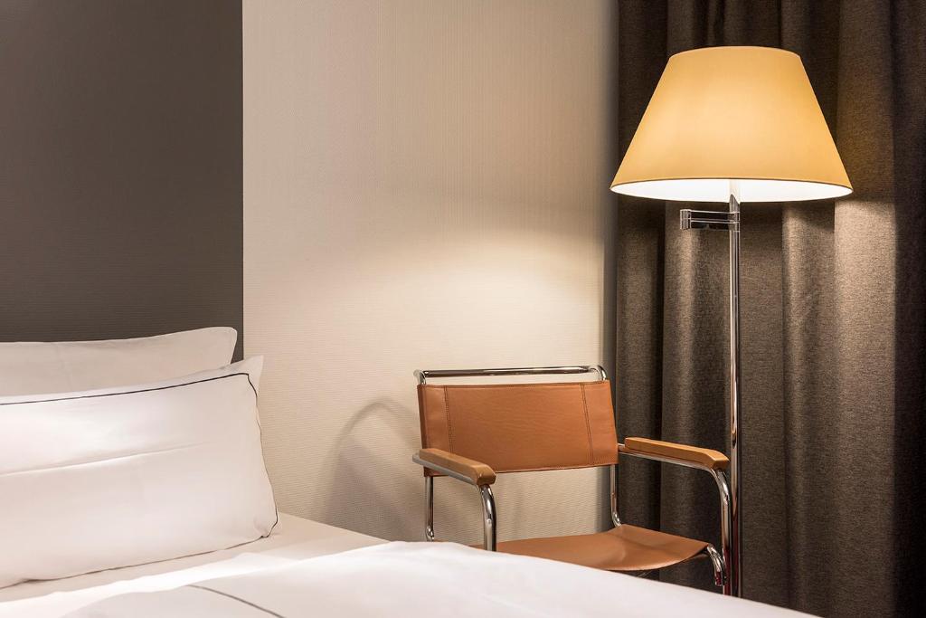 Postel nebo postele na pokoji v ubytování Holiday Inn Berlin City-West by IHG