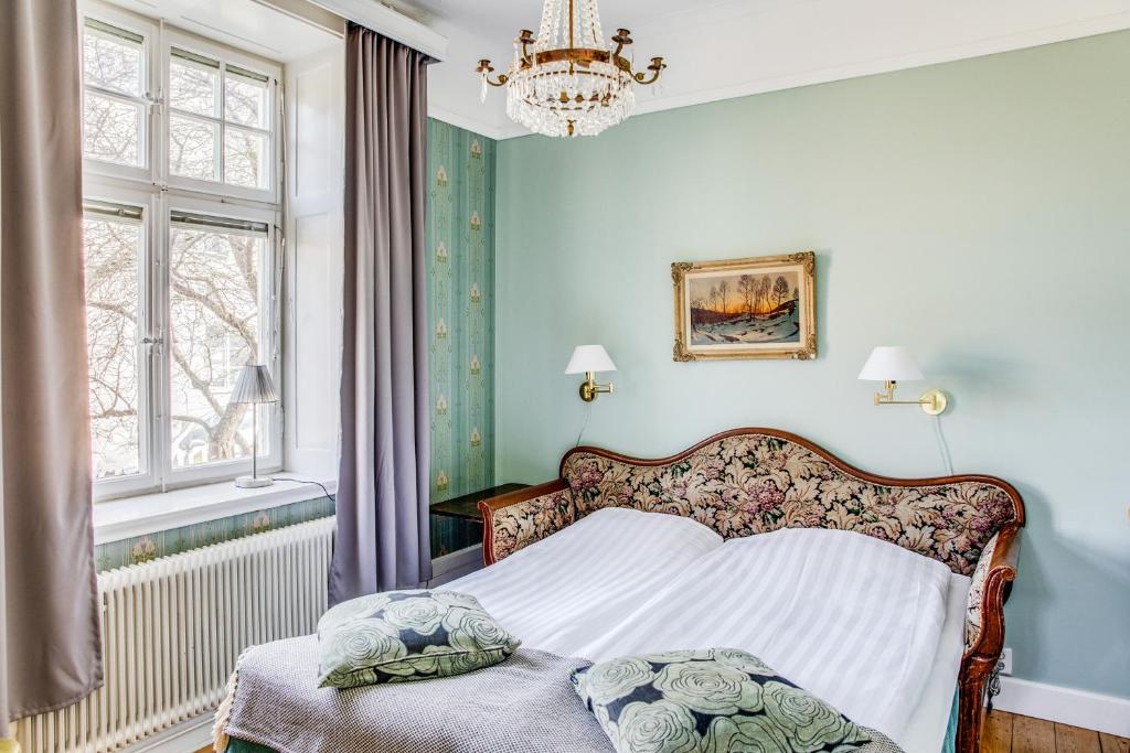 Postel nebo postele na pokoji v ubytování Hotell Breda Blick