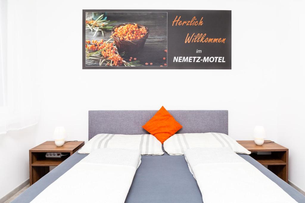 Postel nebo postele na pokoji v ubytování Nemetz-Motel