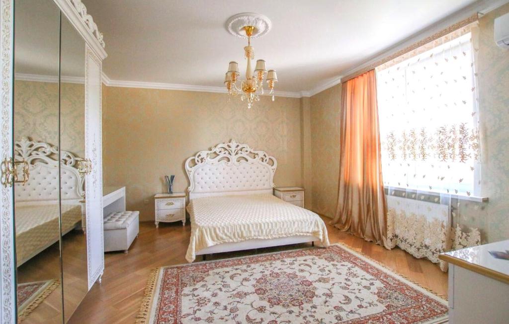 Voodi või voodid majutusasutuse Карла Маркса,34а Однокомнатные апартаменты toas