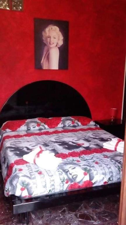 Postel nebo postele na pokoji v ubytování B&B Lo Scrigno