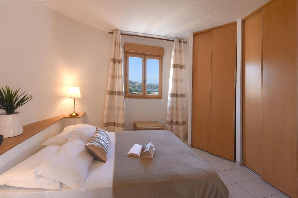 Postel nebo postele na pokoji v ubytování Hotel Le Tilbury