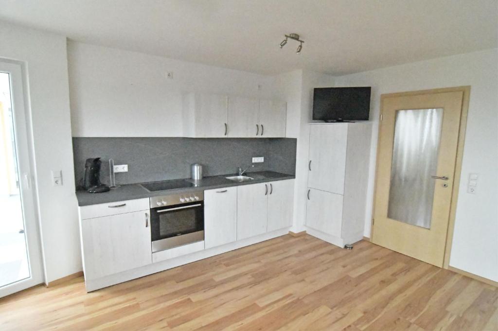 Kuchyň nebo kuchyňský kout v ubytování Ferienwohnung Zürn