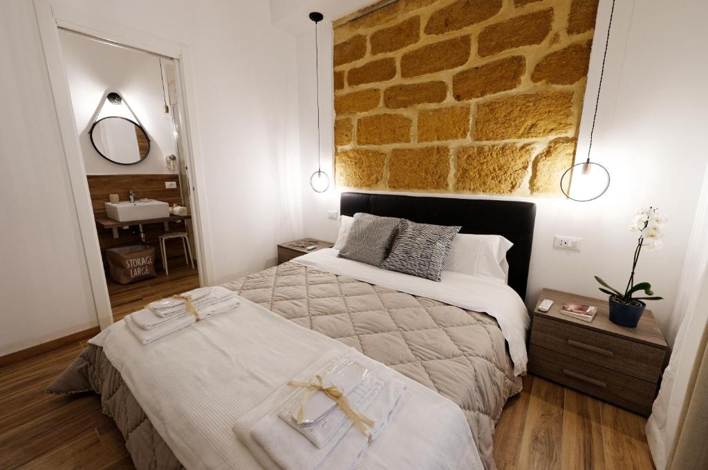 Postel nebo postele na pokoji v ubytování Gocce di Girgenti - comfort suites