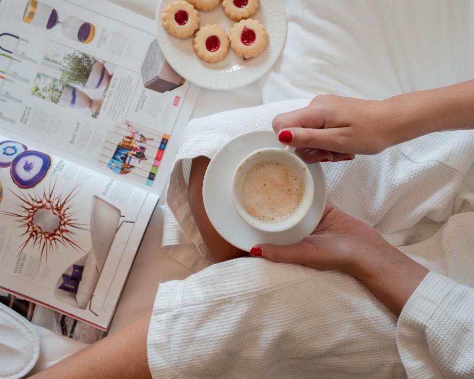 Comodidades para preparar café e chá em Savoy Central Hotel Apartments