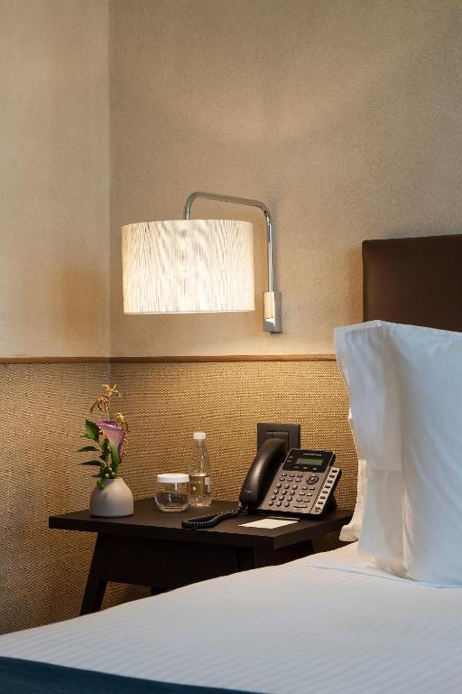 Postel nebo postele na pokoji v ubytování Hotel Fasano Salvador