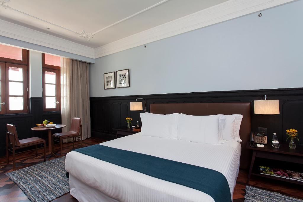 Postel nebo postele na pokoji v ubytování Hotel Fasano Salvador
