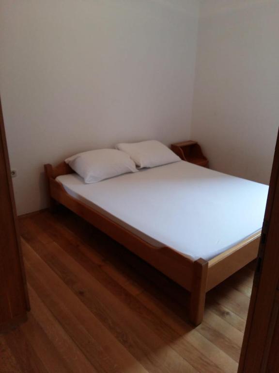 Postel nebo postele na pokoji v ubytování Apartments Villa Cherry