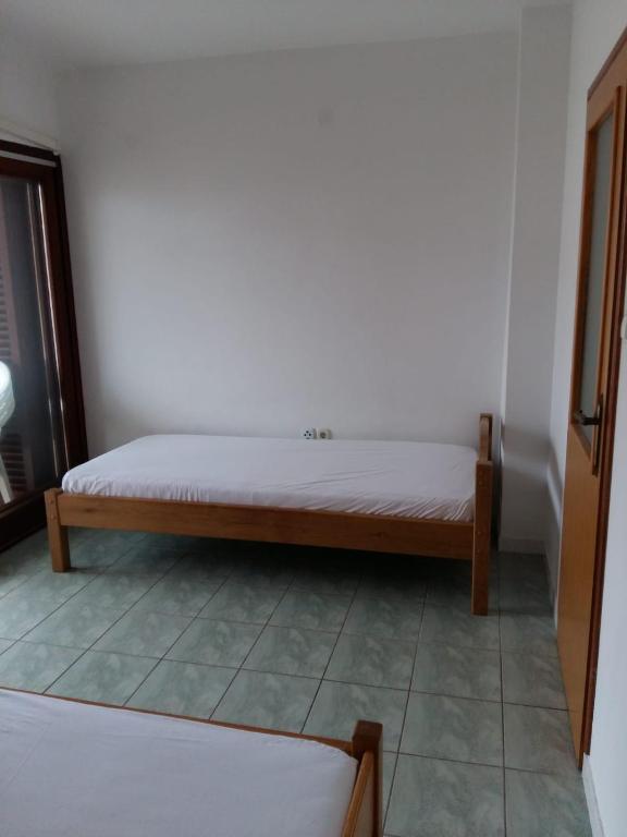 Postel nebo postele na pokoji v ubytování Apartments Villa Cherry