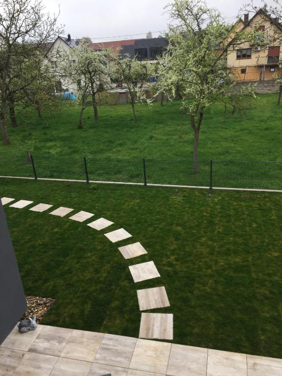 Zahrada ubytování L'Attrap'Rêves : Le confort Hôtelier, la convivialité en plus