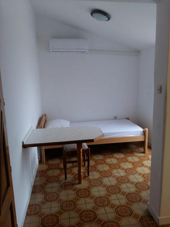Postel nebo postele na pokoji v ubytování Apartments Villa Cherry