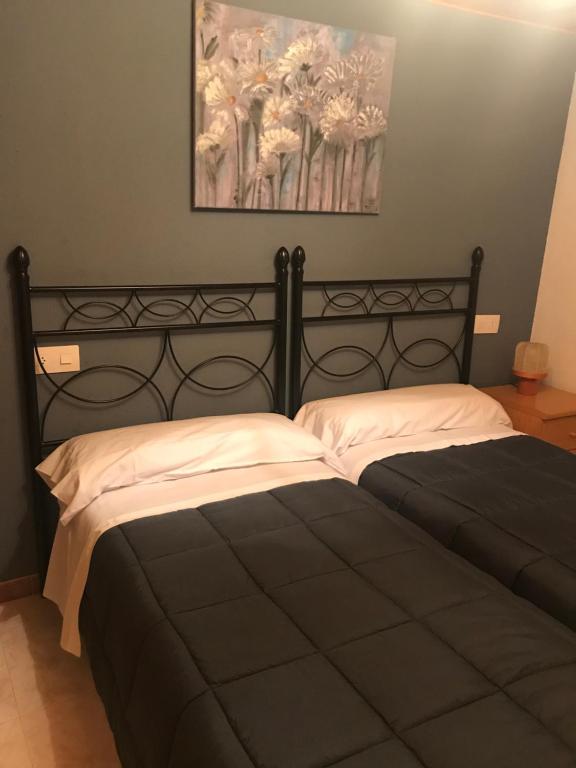Postel nebo postele na pokoji v ubytování Casa Murillo