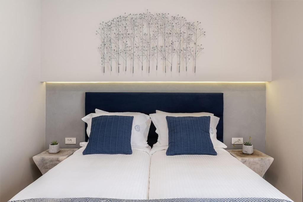 Posteľ alebo postele v izbe v ubytovaní Anemone Holiday Apartment