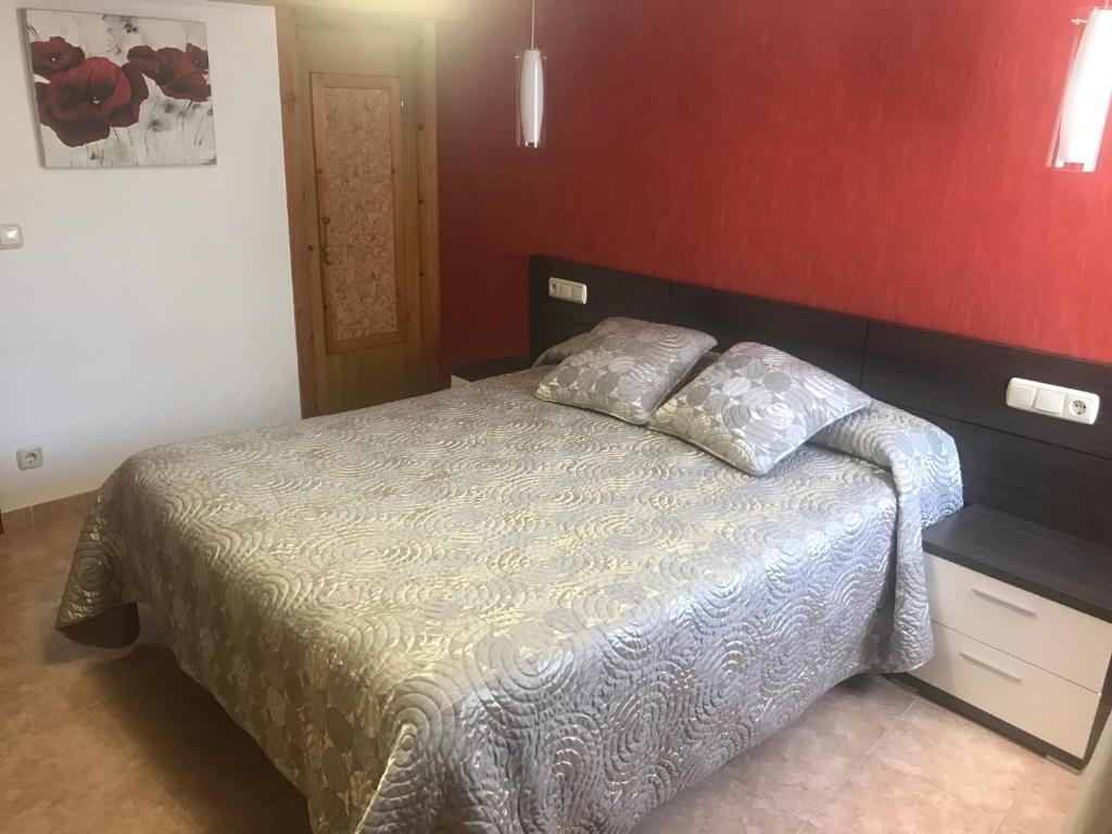 Postel nebo postele na pokoji v ubytování Casa Murillo