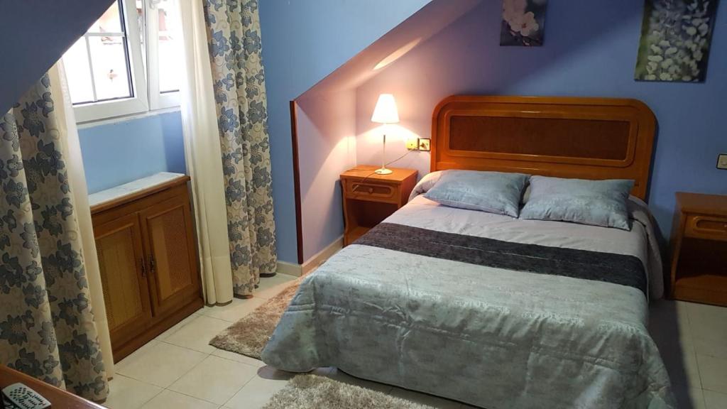 Cama o camas de una habitación en Alojamiento Calzada Romana