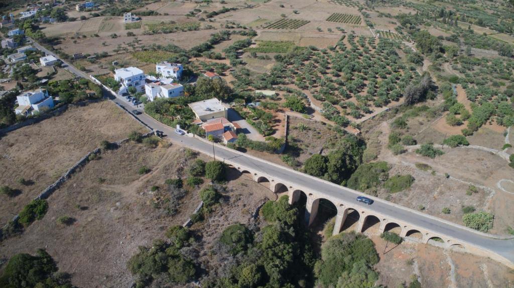 an aerial view of a bridge on a mountain at Theofilos Appartements in Livadi