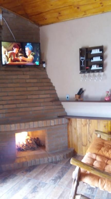 TV a/nebo společenská místnost v ubytování POUSADA BELA HELENA