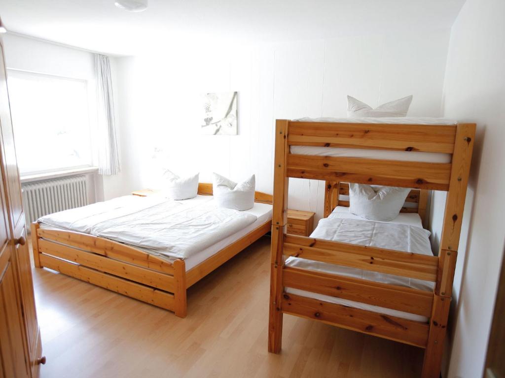 Postel nebo postele na pokoji v ubytování Holiday Home in Germany near Müllerthal Walks
