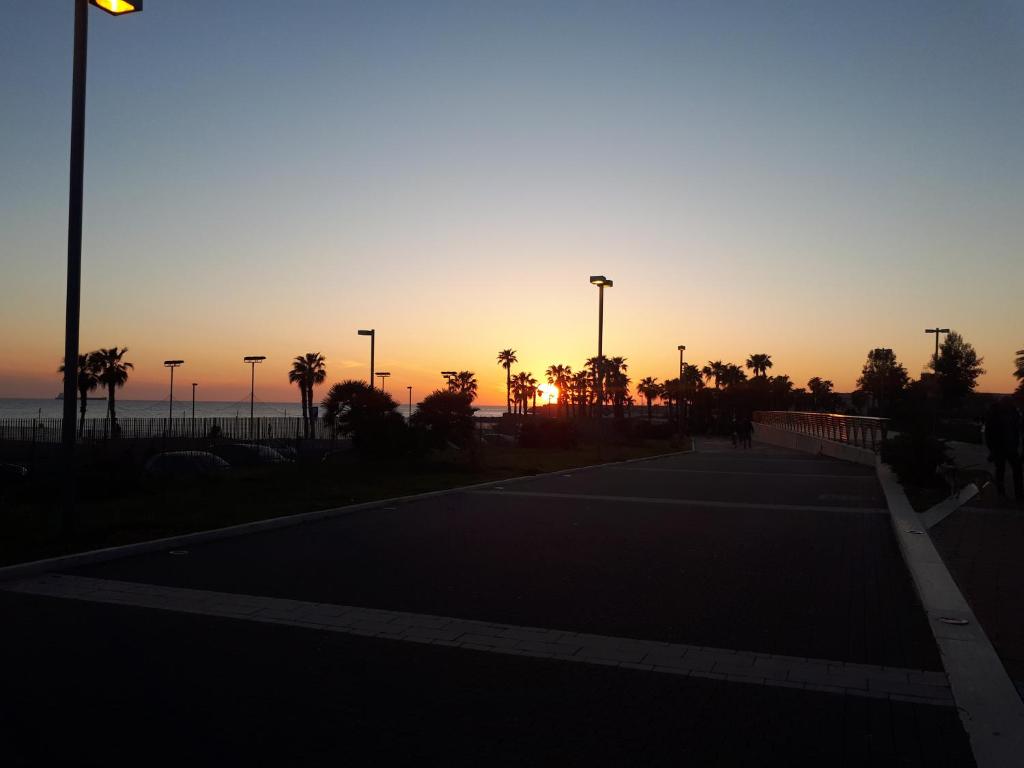 The sunrise or sunset as seen from a panziókat or nearby