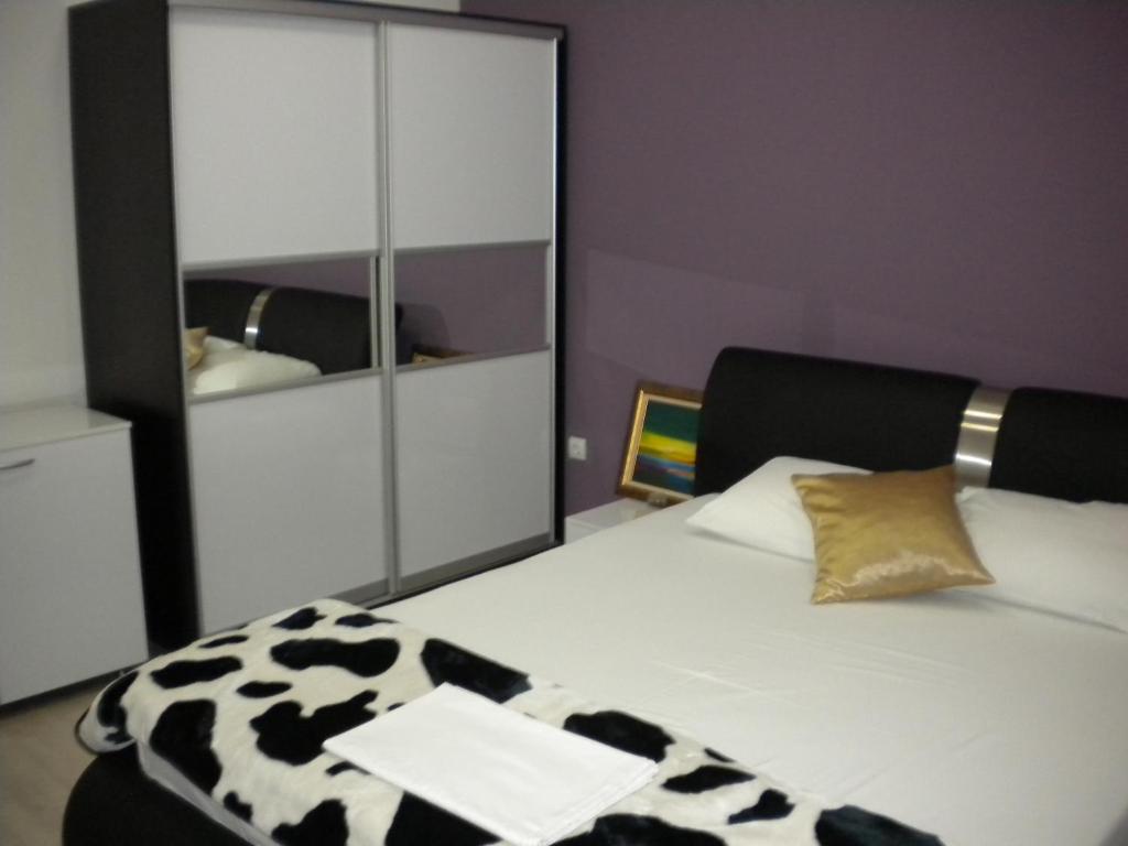 Postel nebo postele na pokoji v ubytování Hotel Leder