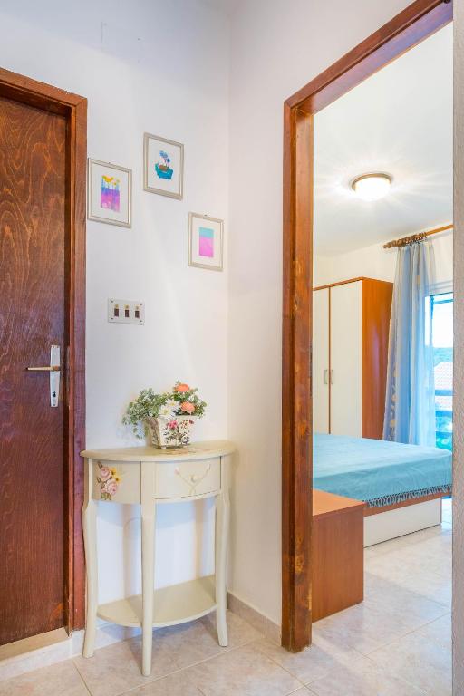 Postel nebo postele na pokoji v ubytování Silver Beach Apartments Vis
