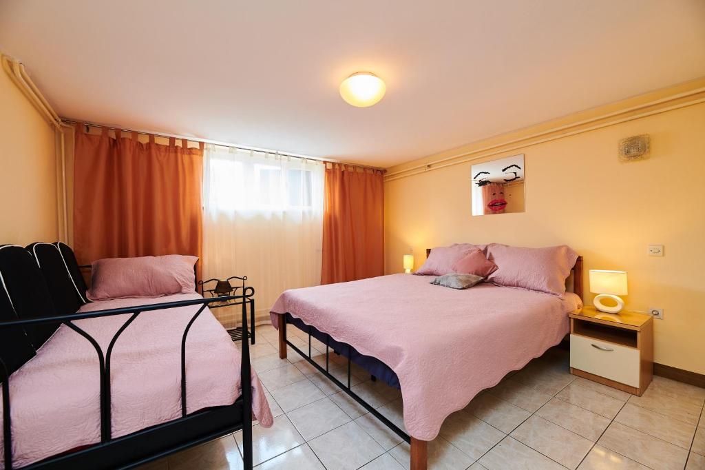 Ένα ή περισσότερα κρεβάτια σε δωμάτιο στο Apartment Ante