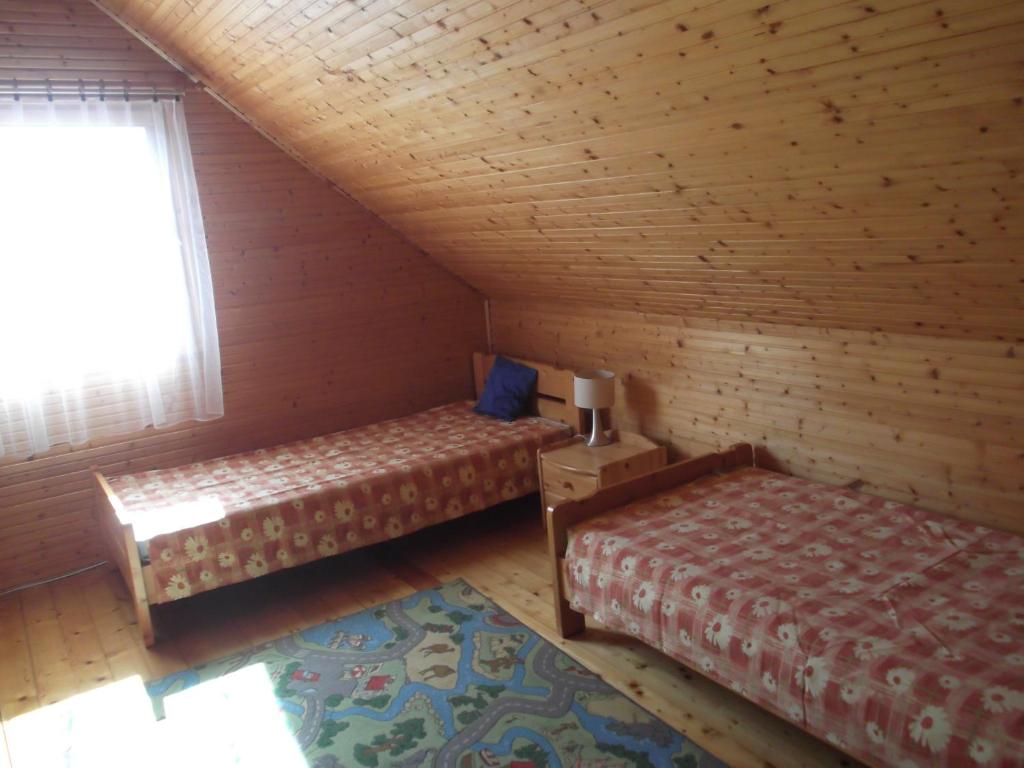 Posteľ alebo postele v izbe v ubytovaní Siesta a Balatonon