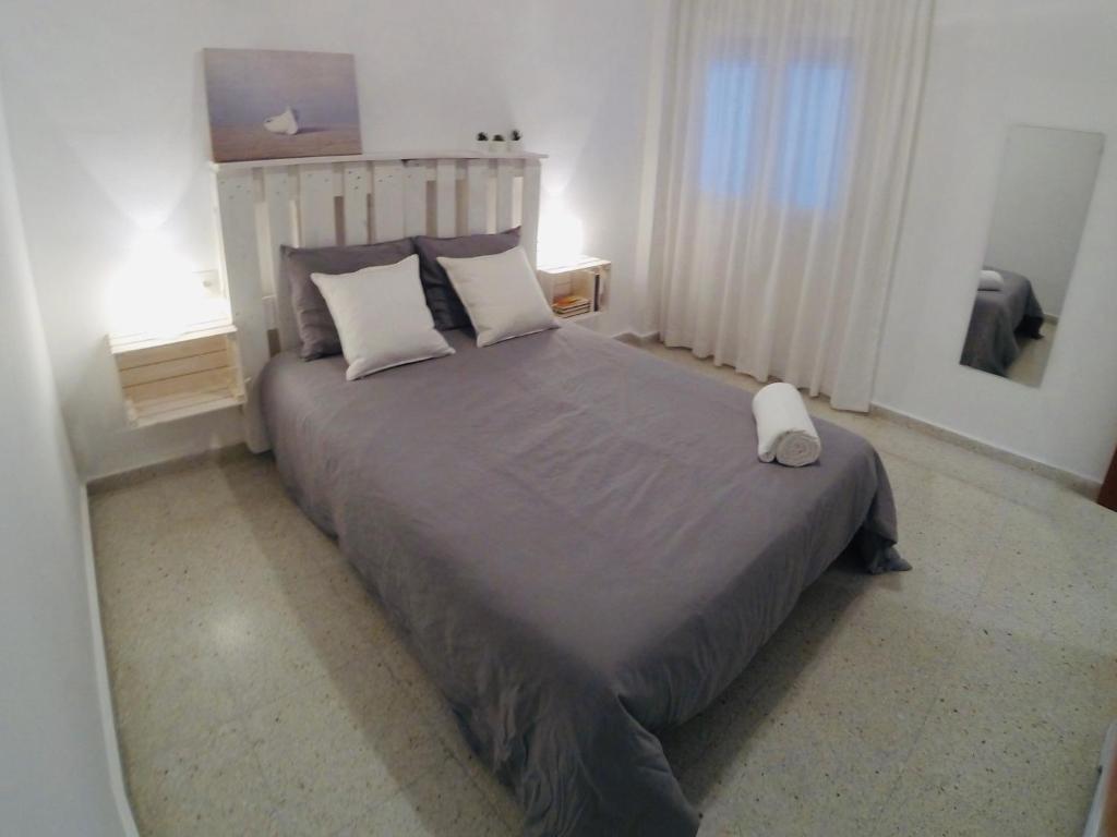 Posteľ alebo postele v izbe v ubytovaní Apartament Platja l'Arquitecte