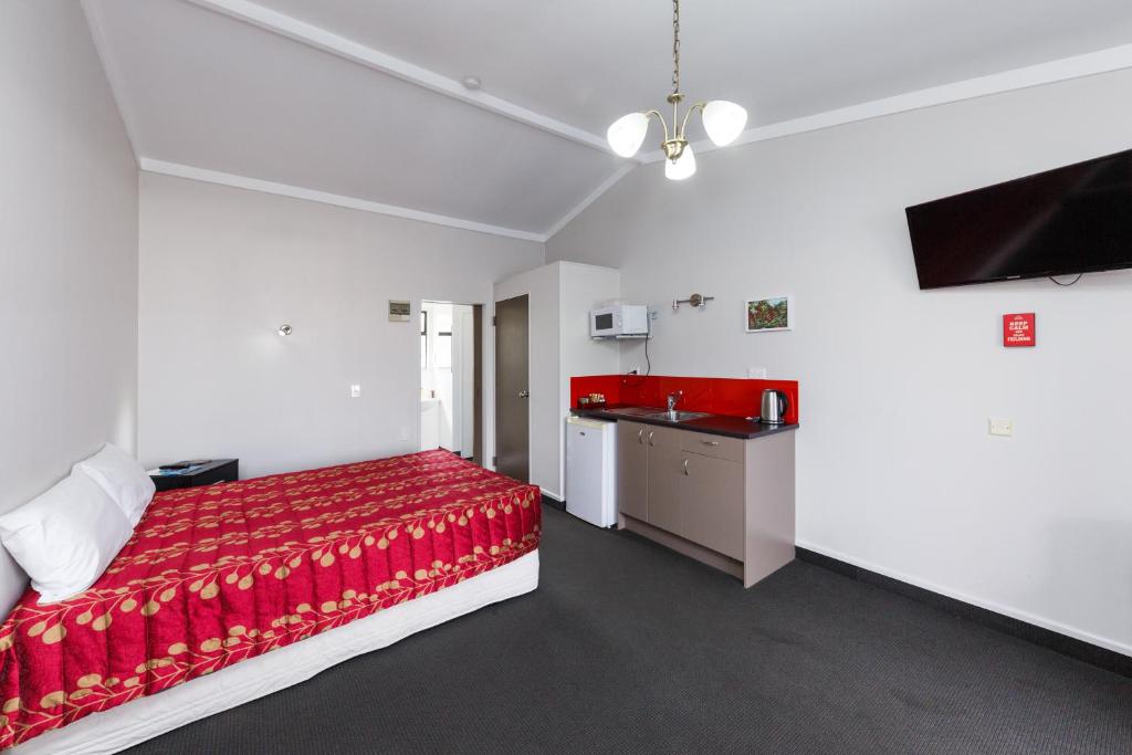 Letto o letti in una camera di Manfeild Park Motel