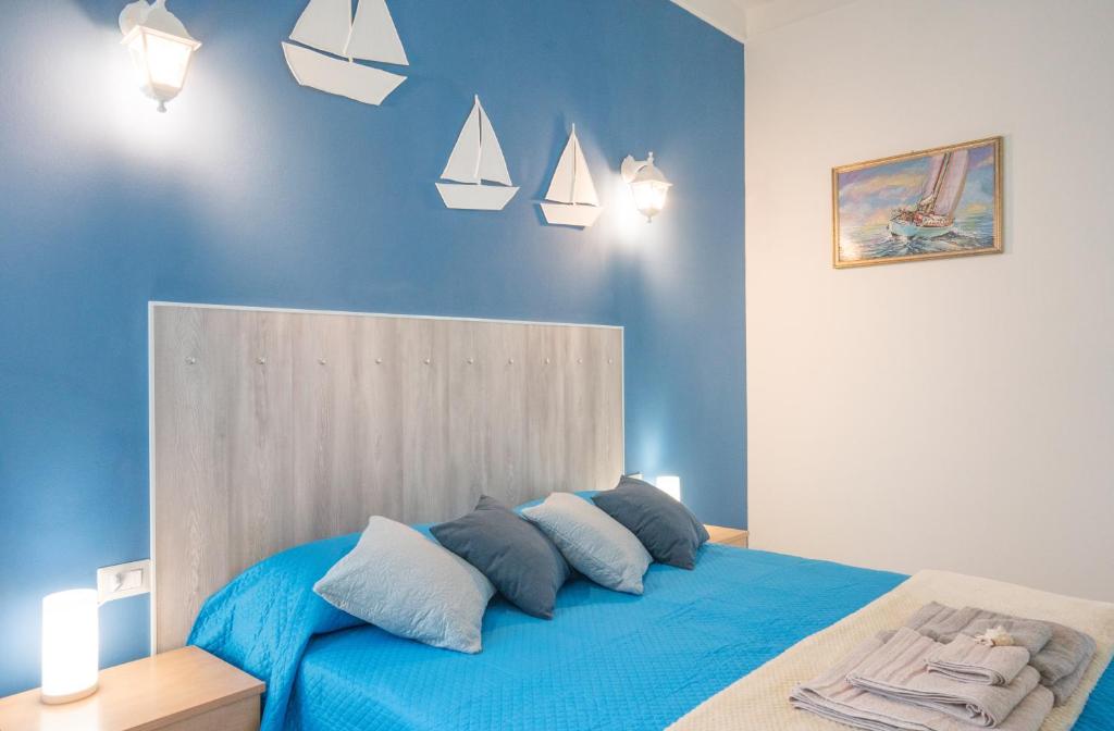 Postel nebo postele na pokoji v ubytování B&B Nell'Isola